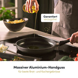 "Werbebild von Hoffmann, das Aluguss-Kochgeschirr zeigt, mit glänzender Oberfläche und robustem Design, ideal für vielseitiges Kochen in der Küche."