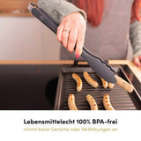 Die lebensmittelechte Küchenzange besteht aus zertifizierten Materialien und garantiert sicheres, hygienisches Greifen und Wenden von Speisen.