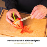 Das Zöppken mit Buchenholzgriff ist extra scharf und sorgt für präzises Schneiden mit angenehmer Handhabung.